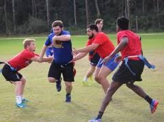 Students playing flag football